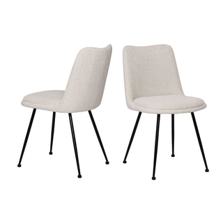 zwei eiße stühle mir runder sitzfläche und rückenlehne. schwarze beine und weißer hintergrund