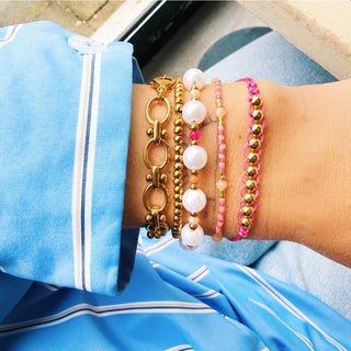 Facettiertes Perlenarmband mit rundem Verschluss – rosa/orange